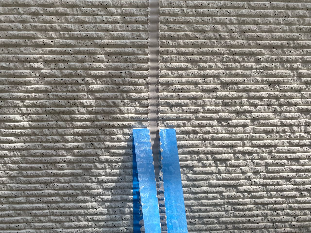 のマスキングテープを撤去